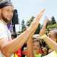 Steph Curry greeting kids at the launch of his Eat. Learn. Play. Foundation on July 18, 2019, in Oakland, Calif.